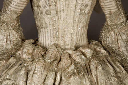 The Rockingham Mantua, c.1760-65 (silk satin brocaded in silver thread with silver lace trim)