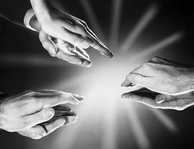 Close-up of three men's hand applauding