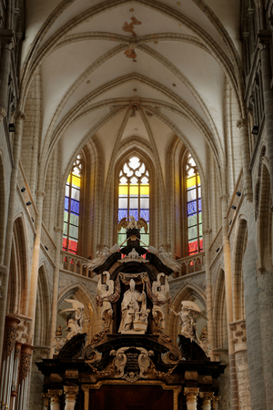Interior. The main altar and stained glass window..