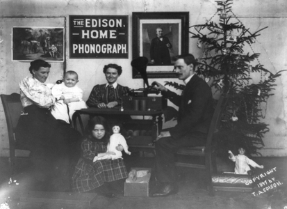 A man, two women and two children listening to a phonograph, 1897
