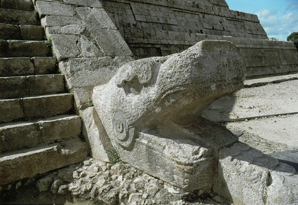 Head of a feathered serpent from the stairs leading to the upper temple of the Kukulcan Pyramid, Chichen Itza, Yucatan