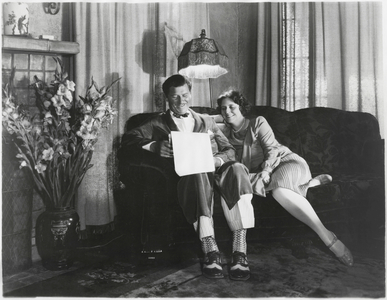 Publicity Portrait of Actor George Bancroft Relaxing at Home with his Wife, Octavia Broske, 1930's (b/w photo)