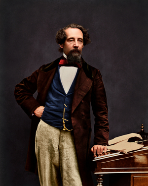 Charles Dickens standing at a desk, colourised by Oliver Clyde, 2020, original image by George Herbert Watkins, 1858-59 (digital)