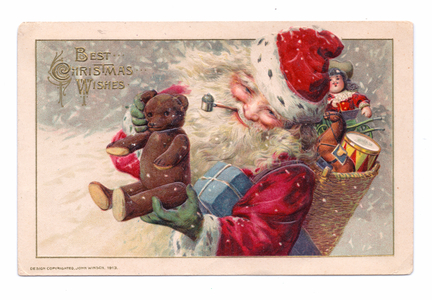 Edwardian Christmas postcard of Father Christmas with a basket of toys on his back holding a teddy bear, c.1910 (colour litho)