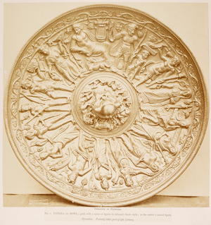 Photograph of circular engraved plate. An archaeological treasure. From finds by Goldsmith from Romania. From the annals of the Arundel Society.