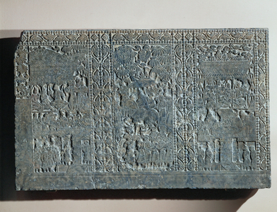 Funeral slab, with bas relief showing landscape with a temple …