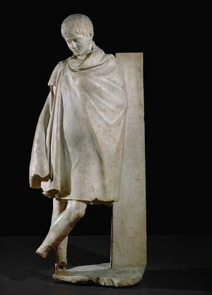 Young boy draped in chlamys after sports