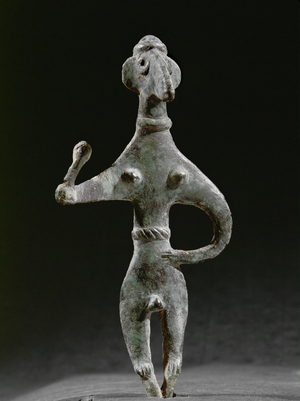 Canaanite figure Baal holding a mace in the right hand, with penis and breasts