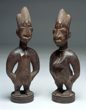 Ibeji Figures (wood, beads, cowrie shells, fabric, pigment)