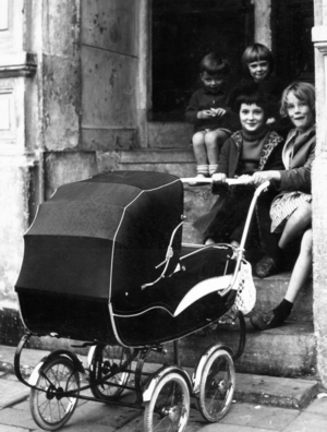 Children with buggy in Amsterdam, 1961 (b/w photo)