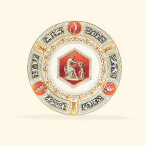 A porcelain dinner plate from the Raphael Service, the centre depicting a classicising lady and a putto, 1903 (porcelain)