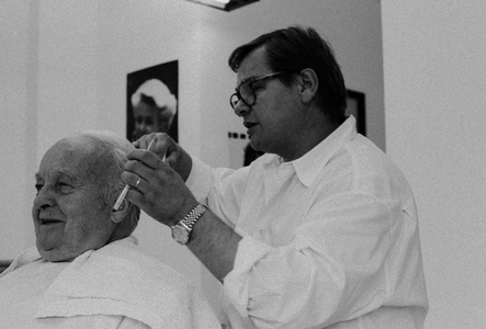 Maurice Cullaz at the hairdresser, Munster, Germany, 1992 (b/w photo)