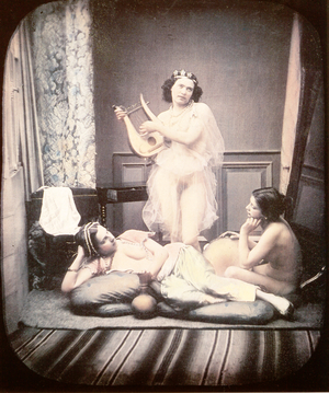 Three almost nude women shown in a studio setting with elements of a harem as well as ancient Greece, 1850 (hand-coloured stereoscopic daguerreotype)