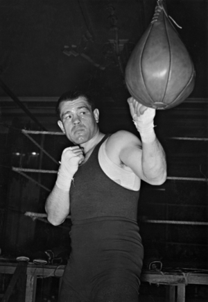 Adolf Heuser training at a punching bag, 1937 (b/w photo)