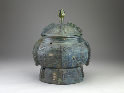 Container (bu) with masks (taotie), dragons, and waterfowl, c.1100-1050 BCE (bronze)