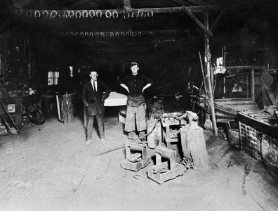 A Blacksmith Shop, c.1900 (b/w photo)