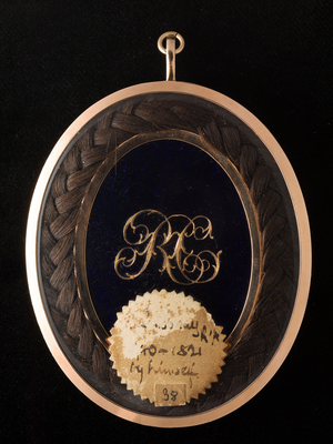 Reverse of a portrait miniature of a Gentleman wearing blue coat with gold buttons, tied stock and frilled cravat, c.1790