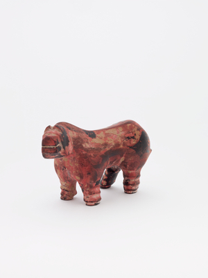 Dog (grey earthenware with red and black painted decoration)