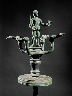 A sacrificer with a knife and a dish …