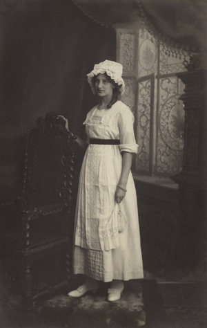 Girl in a lace cap (b/w photo)