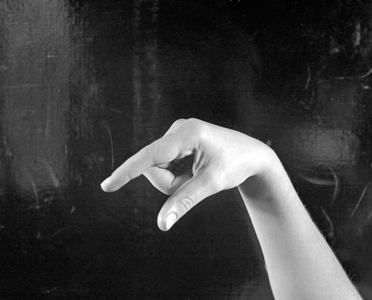 Letter Q in finger alphabet (b/w photo)