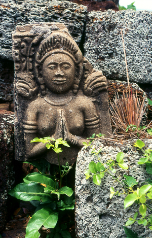 Cambodia: Stone carvings that once decorated the walls and doorways of the temple are now strewn around the complex, Phnom Chisor temple, Takeo Province