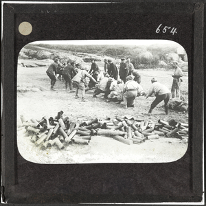 A tug-of-war between British and French troops, September 1916 (lantern slide)