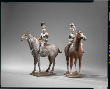 Two Equestrian Figures, Tang Dynasty (earthenware with pigments)