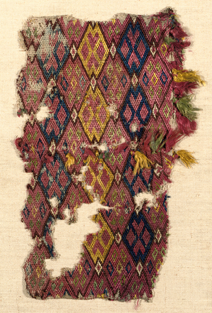 A Mamluk weft-faced silk woven fragment, c.1300-99 (linen & silk)