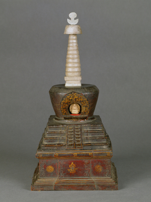 Stupa - the 13 steps of the upper part symbolize the 13 steps of enlightment, in the shrine window a clay cast of the Buddha (wood with partial lacquer guilding)