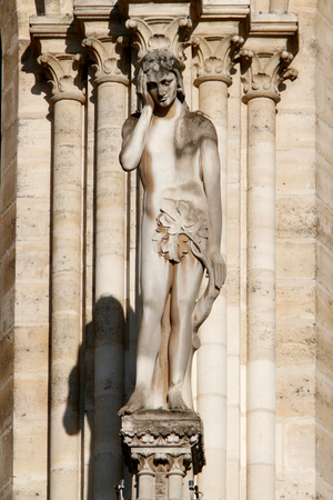 Statue of Adam, Notre Dame de Paris Cathedral, West Facade (photo)