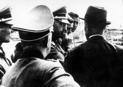 Himmler (Center), Chief of the Ss Visiting Oswiecim (Auschwitz) in 1942 Accompanied by a Group of Ss Officers, on Right in Civillian Dress is Faust of I, G, Farben.