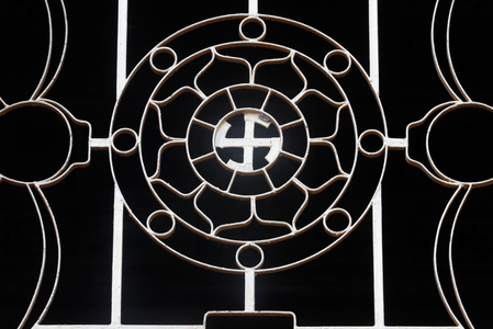 Vinh Trang Buddhist temple, Buddhist symbols: Dharma Wheel and Svastika, My Tho, Vietnam (photo)