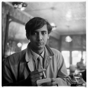 Portrait of poet Dom Moraes in Soho pub, London, mid early 1950's