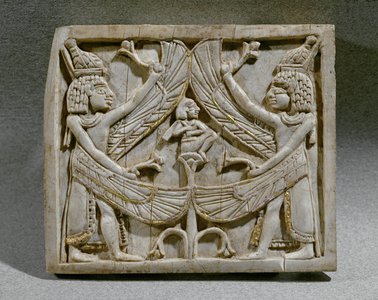 Two winged genii, in the center Horus on the lotus …