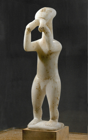 Musician playing the double flute