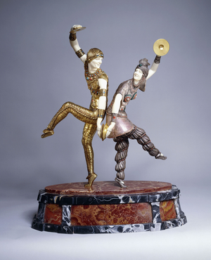 Russian Dancers,  (silvered, gilt and gold painted bronze and ivory statuette, mott)