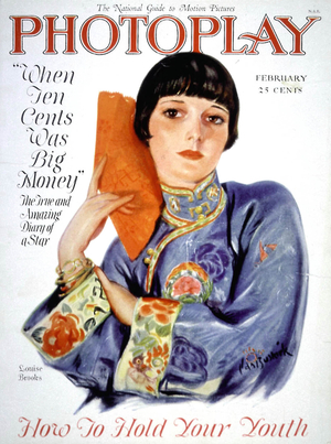 American actress Louise Brooks (1906-1985) on cover of Photoplay magazine with japanese suit and fan, february 1927