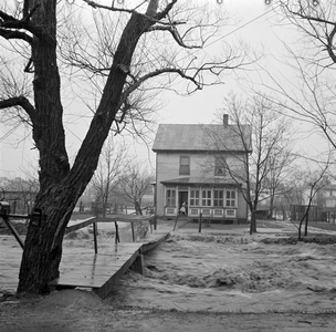 Swollen mountain streams, threatening valley homes, West Virginia, 1936 (b/w photo)