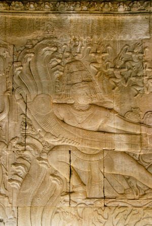 Cambodia: The demon king Ravana holding the head of the five-headed naga (mythical snake) known as Vasuki, Churning of the Ocean of Milk (Sea of Milk), South Wing, East Gallery, Angkor Wat