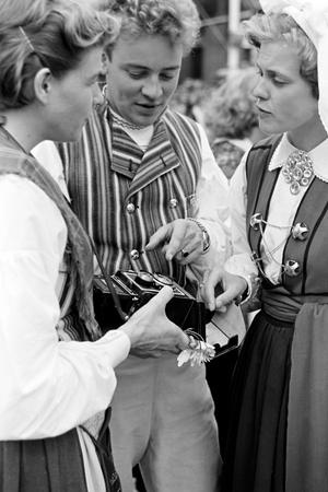 Traditional couple at the Volksfest, Schleswig-Holstein, Germany, 1960s
