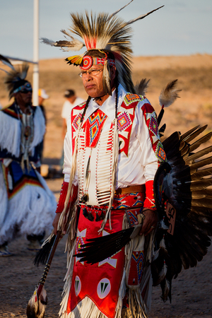 A man dancing at the Southern Company Traditional Powwow event in Montezuma Creek, Utah., 2012 (photo)