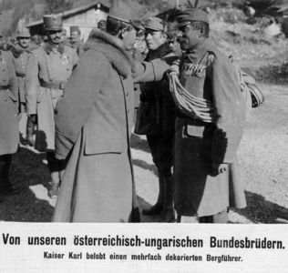 Emperor Charles I. commends an alpine guide, 1917 (b/w photo)