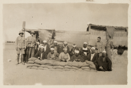 British soldiers supervising Egyptian non-combatant political prisoners, c.1916 (b/w photo)