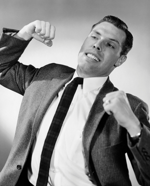 Close-up of a businessman stretching