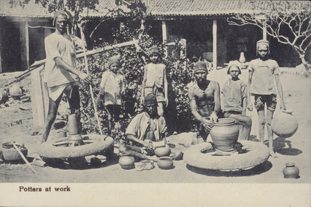 Potters at work (b/w photo)