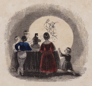 Watching a magic lantern show (coloured engraving)