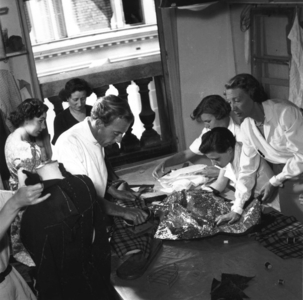 French Fashion Designer Jacques Fath (1912-1954) in his Workshop in August 1949 in Paris With Design Assistants (b/w photo)