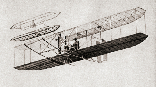 The first controlled, powered and sustained heavier-than-air human flight, on December 17, 1903, from  The Pageant of the Century, pub. 1934