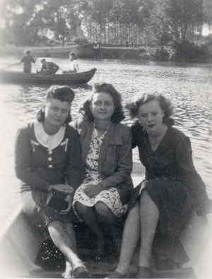 Three young women in a boat on a lake, 1944 (photo)